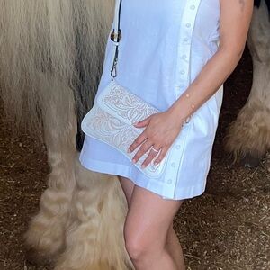 Alejandro Yeo handmade white leather crossbody bag, floral embossed